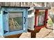 A Little Free Library offers books for and adults at 200 Parkbranch Ln, Cary, NC 27519