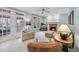 Cozy living room with fireplace and access to sunroom at 200 Parkbranch Ln, Cary, NC 27519