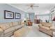 Open floor plan showcases a cozy living room adjacent to a kitchen with center island at 200 Parkbranch Ln, Cary, NC 27519