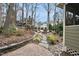 Outdoor patio with a stone walkway, comfortable seating, and a charming fire pit area at 200 Parkbranch Ln, Cary, NC 27519