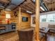 Basement features a lounge area with a tv, and a wood accent wall at 2001 Manuel St, Raleigh, NC 27612
