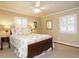 Bedroom with a ceiling fan, and warm neutral tones at 2001 Manuel St, Raleigh, NC 27612