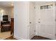 Bright foyer with white trim, traditional doors, and views to the living room at 2001 Manuel St, Raleigh, NC 27612