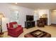 Spacious living room with plush seating, large windows, and abundant natural light at 2001 Manuel St, Raleigh, NC 27612
