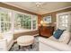 Cozy sun room filled with natural light, with a large window overlooking the yard at 2001 Manuel St, Raleigh, NC 27612