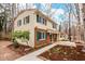 Attractive two-story home with brick accents, green shutters, and well-maintained landscaping at 203 Lexington Rd, Chapel Hill, NC 27516