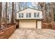 Two-story garage with new door at 203 Lexington Rd, Chapel Hill, NC 27516