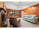 Warm living room featuring a fireplace, bookshelves, and comfortable seating at 203 Lexington Rd, Chapel Hill, NC 27516