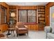 Cozy living room with built-in bookshelves, a window seat, and natural light at 203 Lexington Rd, Chapel Hill, NC 27516