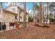 Rear patio with chairs showcasing outdoor space for relaxation and entertaining at 203 Lexington Rd, Chapel Hill, NC 27516