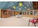 Large sunroom boasting a skylight, and dining area, ideal for entertaining at 203 Lexington Rd, Chapel Hill, NC 27516