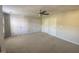 Large bedroom featuring neutral carpet and multiple closets perfect for organized storage solutions at 21 Suncrest Ct, Durham, NC 27703