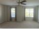 Bright bedroom with natural light, neutral walls, and a ceiling fan for a comfortable ambiance at 21 Suncrest Ct, Durham, NC 27703
