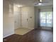 Bright entryway with a large window, wood-look floors, and multiple closets for convenient storage at 21 Suncrest Ct, Durham, NC 27703