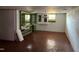 Basement room with painted walls, concrete block, and partially built-in shelving at 2117 George Winston Rd, Oxford, NC 27565