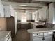 Vintage kitchen with ample cabinet space and retro countertops at 2117 George Winston Rd, Oxford, NC 27565