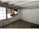 Well-lit room with a panel door, tile flooring, and ample natural light at 2117 George Winston Rd, Oxford, NC 27565