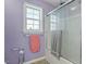 The bathroom features a glass enclosed shower and natural light at 2152 Haig Point Way, Raleigh, NC 27604