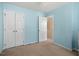The bedroom is light blue with a large closet and lots of open space at 2152 Haig Point Way, Raleigh, NC 27604