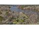 Aerial view of land parcel with property lines outlined in yellow at 220 Choctaw Dr, Louisburg, NC 27549