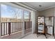 Bedroom with water view and balcony access at 220 Choctaw Dr, Louisburg, NC 27549
