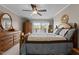 A bedroom with access to outdoor deck overlooking the lake at 220 Choctaw Dr, Louisburg, NC 27549