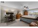 A bedroom with a desk, dresser, and lake views at 220 Choctaw Dr, Louisburg, NC 27549