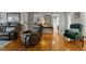 Living room area featuring hardwood floors and neutral walls at 220 Choctaw Dr, Louisburg, NC 27549