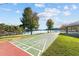 Outdoor recreation area featuring a shuffleboard court, pavilion, and lake access for endless fun at 220 Choctaw Dr, Louisburg, NC 27549
