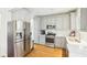 Modern kitchen featuring stainless steel appliances, white subway tile and grey cabinetry at 2431 Winburn Ave, Durham, NC 27704