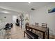 Elegant staircase with wooden banister and hardwood steps leading to the upper level at 3015 Cypress Lagoon Ct, Durham, NC 27703