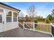 View of the wooden back deck with steps leading to the spacious yard at 3112 Gold Dust Ln, Willow Springs, NC 27592