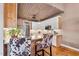 Charming kitchen with handcrafted wooden ceiling, white cabinets and farmhouse sink at 3112 Gold Dust Ln, Willow Springs, NC 27592