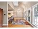 Spacious dining room featuring wooden ceiling, access to kitchen and abundant natural light at 3112 Gold Dust Ln, Willow Springs, NC 27592