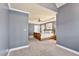 Comfortable main bedroom with tray ceilings, soft carpet, and abundant natural light, creating a peaceful retreat at 3112 Gold Dust Ln, Willow Springs, NC 27592