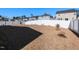 Large backyard enclosed by a privacy fence, providing a secure outdoor space at 3354 Brunot St, New Hill, NC 27562