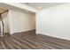 Cozy living room featuring hardwood floors, staircase and neutral white walls at 3354 Brunot St, New Hill, NC 27562