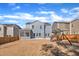 Backyard with a playset and a view of the home's exterior at 3381 Lovage Dr, Apex, NC 27502