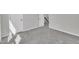 Bedroom featuring carpeted floors, a closet, and a doorway that leads to an additional room at 3381 Lovage Dr, Apex, NC 27502