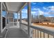 Covered front porch with white columns overlooking the neighborhood at 3381 Lovage Dr, Apex, NC 27502
