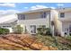 Backyard with stone pavers, lush landscaping, and view of the back of the home at 3439 Archdale Dr, Raleigh, NC 27614