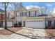 Charming two-story home with a two-car garage and blue shutters at 3439 Archdale Dr, Raleigh, NC 27614