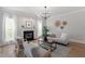 Bright living room with fireplace and modern decor at 3439 Archdale Dr, Raleigh, NC 27614