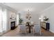 Cozy living room features a fireplace, and stylish furniture, creating a welcoming atmosphere at 3439 Archdale Dr, Raleigh, NC 27614