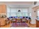 Breakfast nook area with bench seating, lots of windows and natural light at 3604 Pasture Rd, Hillsborough, NC 27278