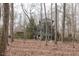 Modern home nestled among trees on a wooded lot at 3604 Pasture Rd, Hillsborough, NC 27278