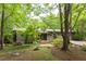 Charming home featuring landscaped yard, wooden steps, and entryway at 3604 Pasture Rd, Hillsborough, NC 27278