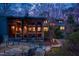 Outdoor living space with stone patio and modern exterior at 3604 Pasture Rd, Hillsborough, NC 27278