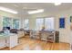 Bright studio with natural light from many windows and hardwood floors at 3604 Pasture Rd, Hillsborough, NC 27278