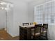 Cozy dining area with abundant natural light and modern furnishings at 3924 Volkswalk Pl, Raleigh, NC 27610